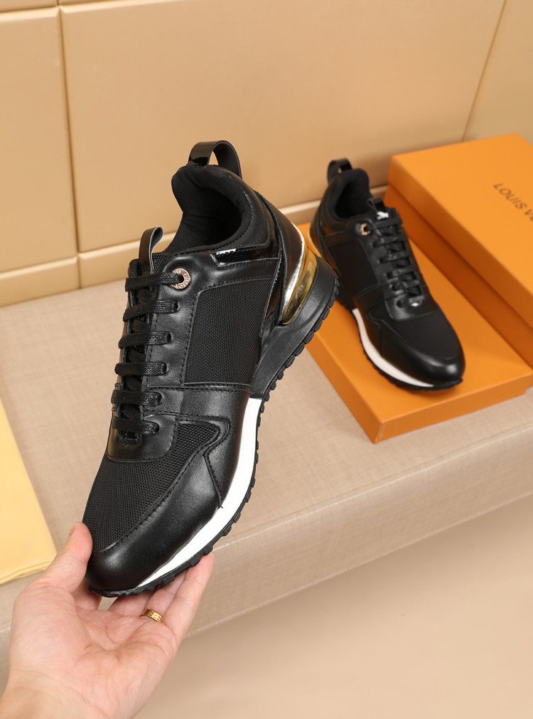 Louis Vuitton Black Gold Accent Sneakers — model