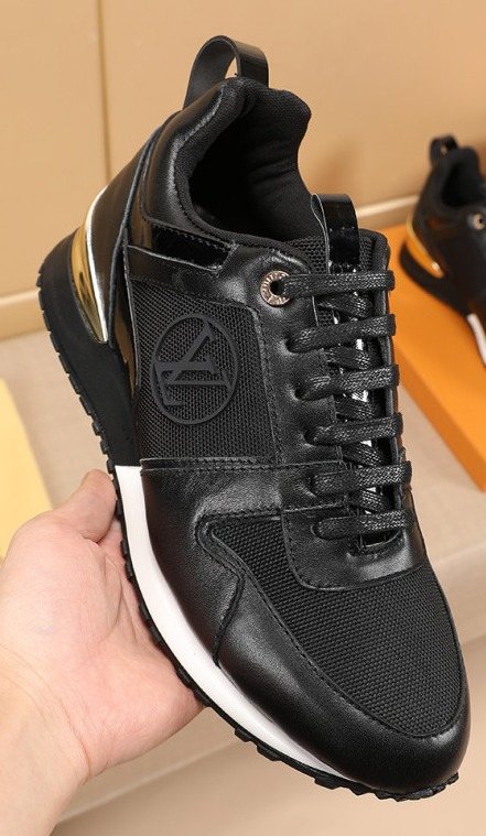 Louis Vuitton Black Gold Accent Sneakers — hero