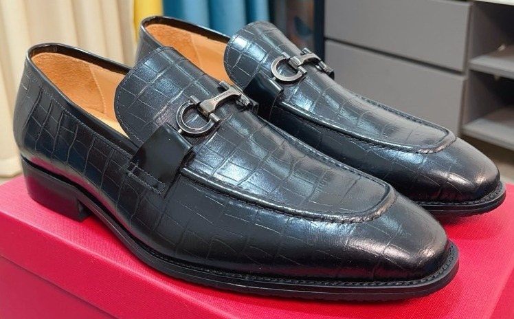 Ferragamo Black Embossed Bit Loafers — hero