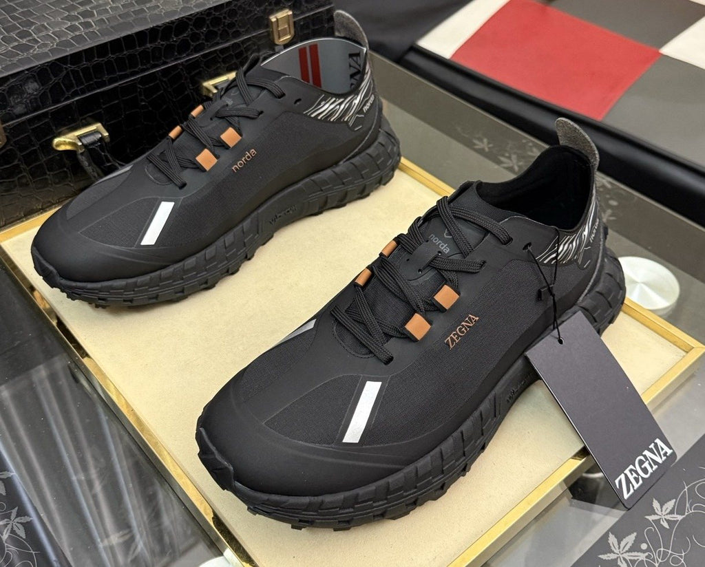 ZEGNA Black Trail Running Shoes with Orange Accents — hero