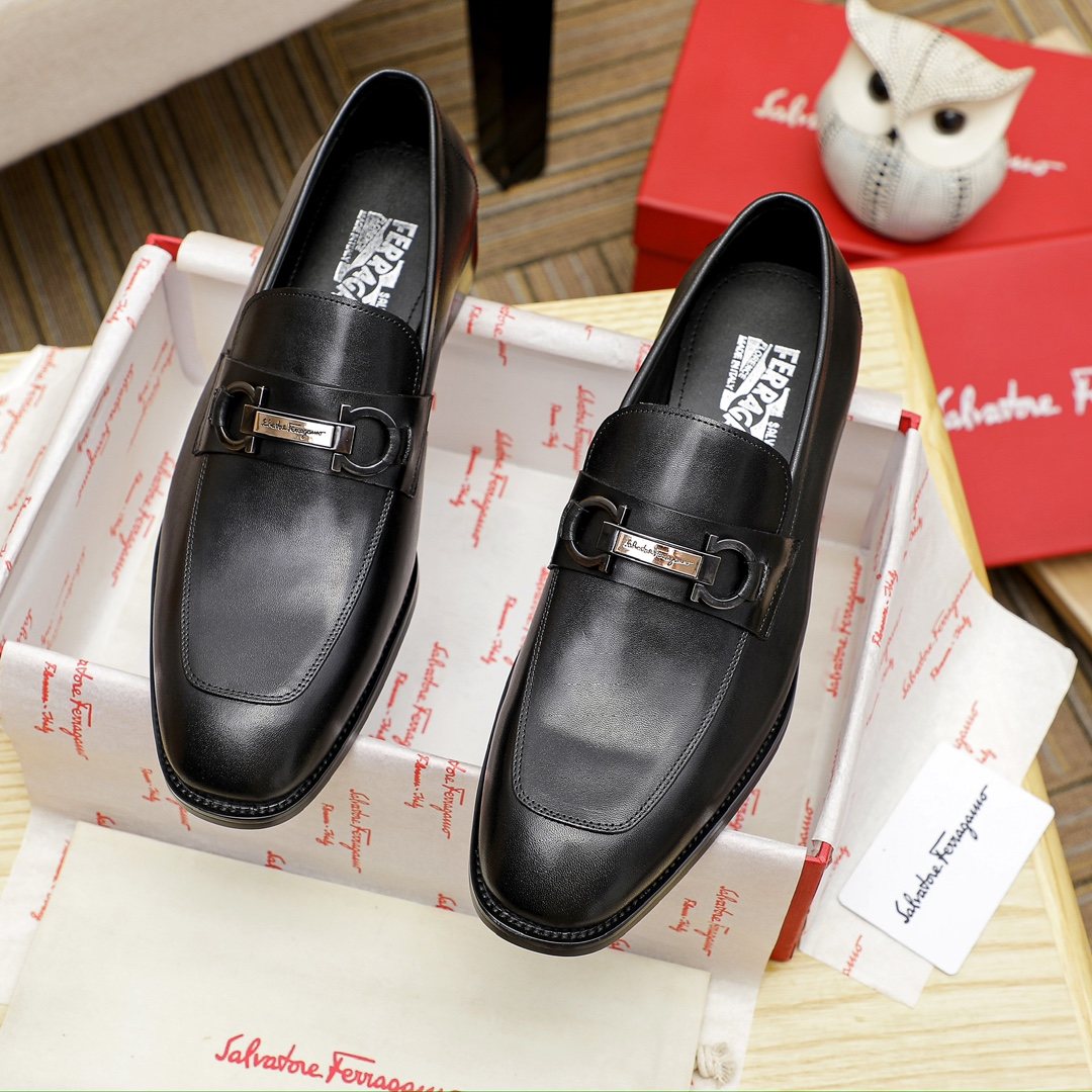Ferragamo Black Metal Bit Loafers — front