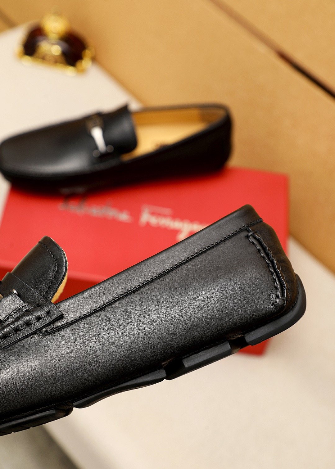 Ferragamo Black Metal-Trim Loafers — detail