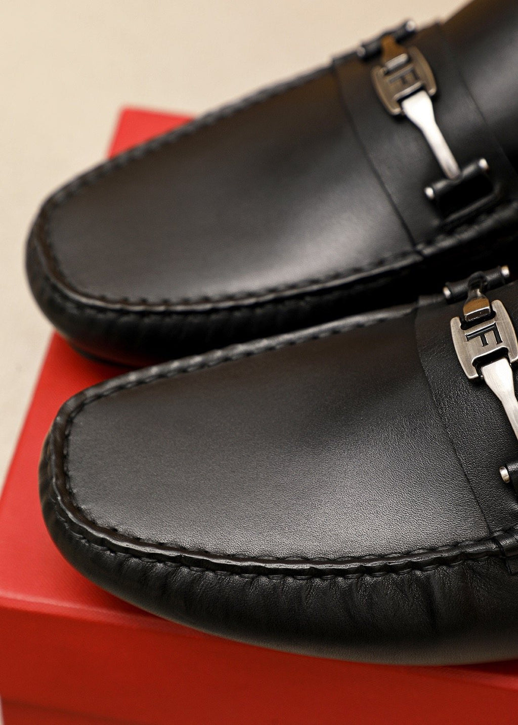 Ferragamo Black Metal-Trim Loafers — detail