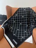 Chanel Black and Ivory Grid Shawl Scarf — hero