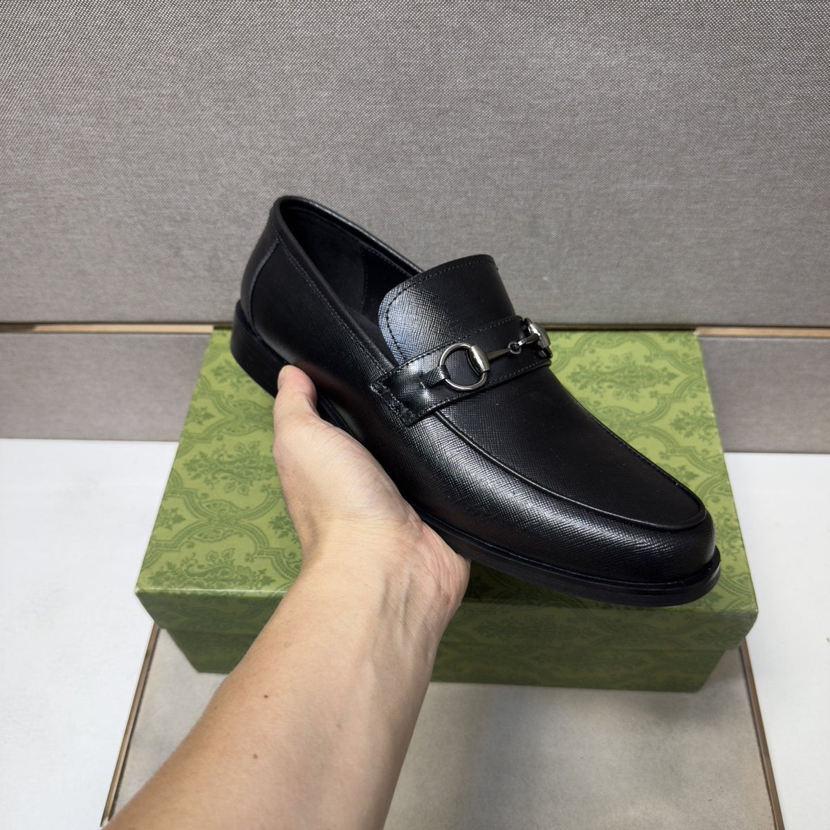 Gucci Black Metal-Detail Loafers — model