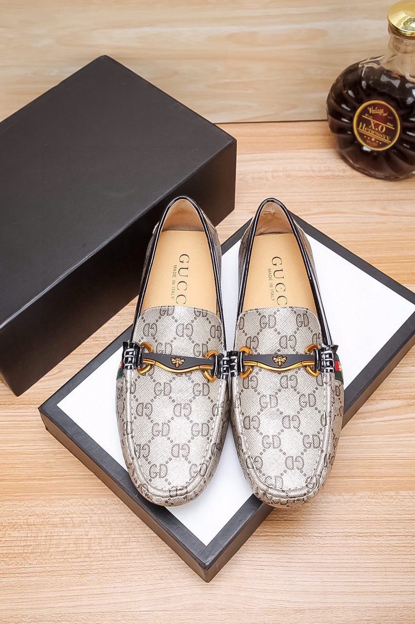 Gucci Patterned Driving Loafers — hero