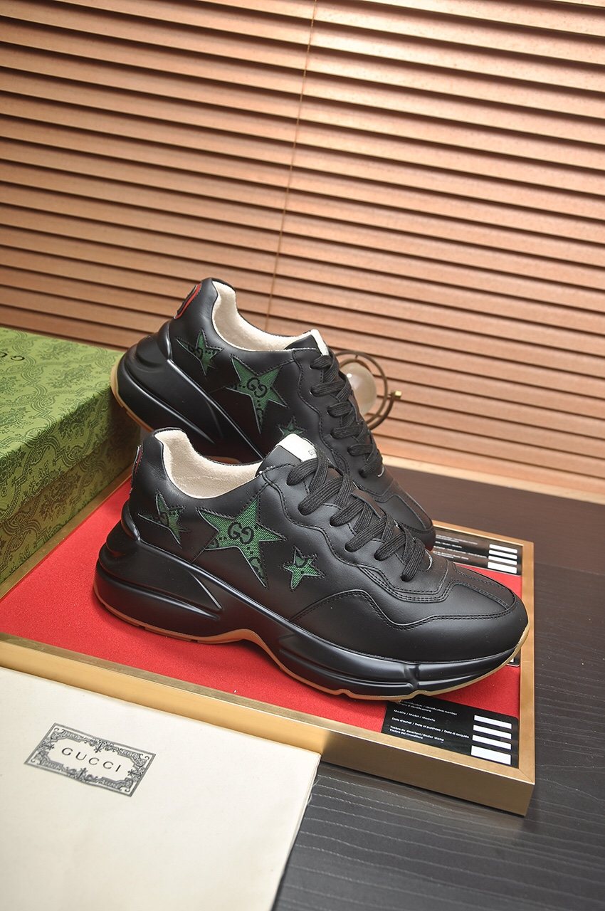 GUCCI Black and Green Star Sneakers — front