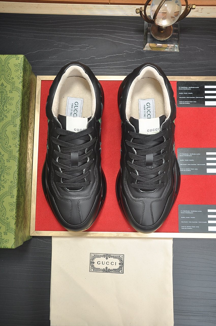 GUCCI Black and Green Star Sneakers — front