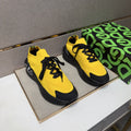 Dolce & Gabbana Yellow and Black Lace-Up Sneakers — hero