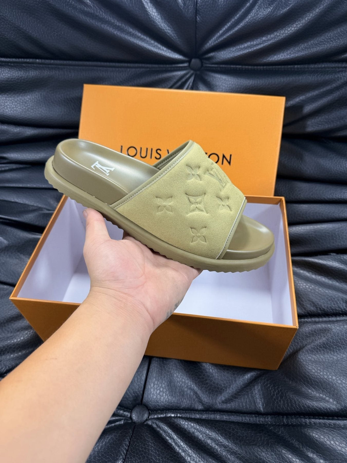 Louis Vuitton Embossed Slide Sandals — model
