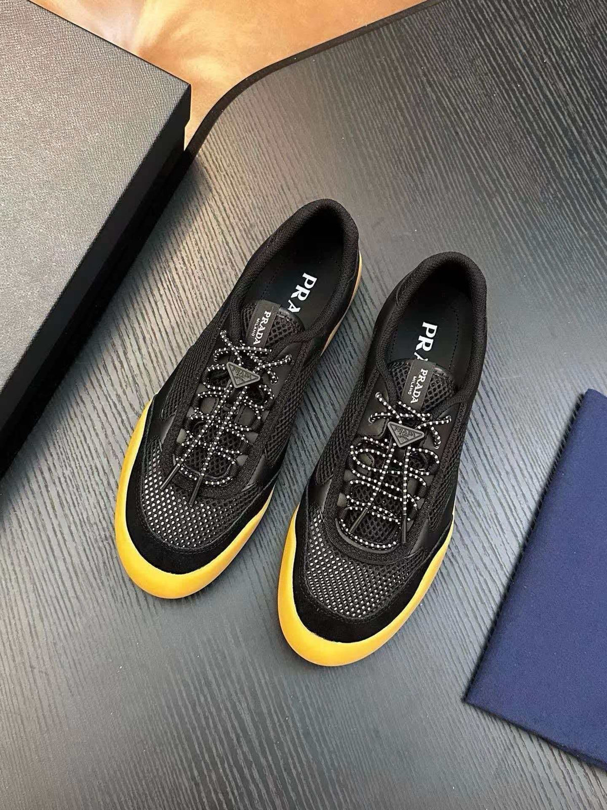 Prada Black Sneakers with Yellow Sole — hero