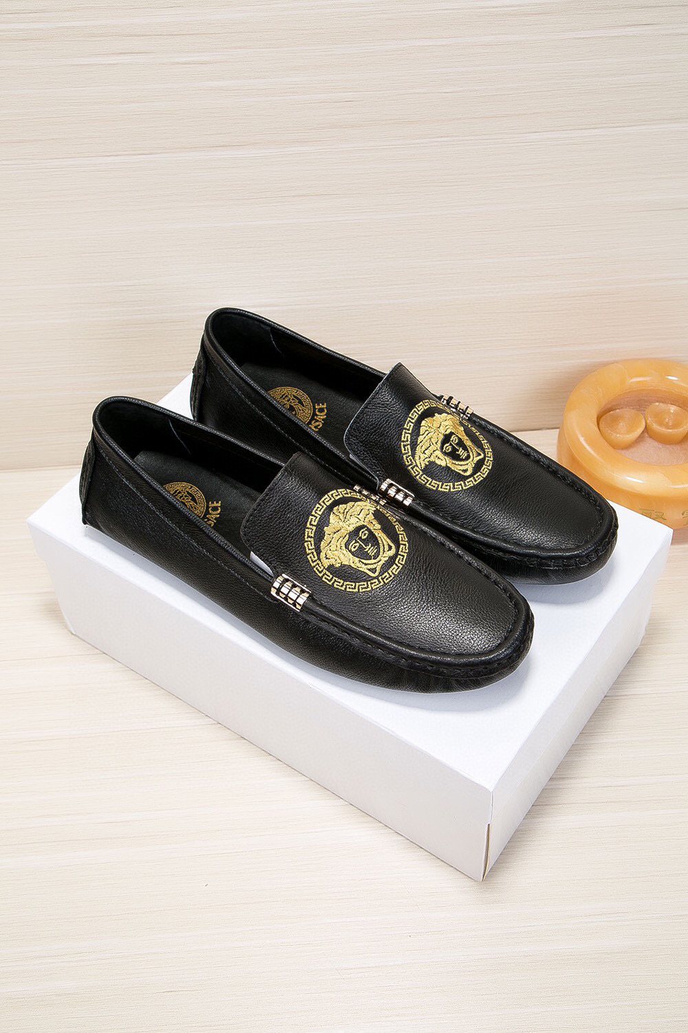 Versace Black Gold Medallion Loafers — hero