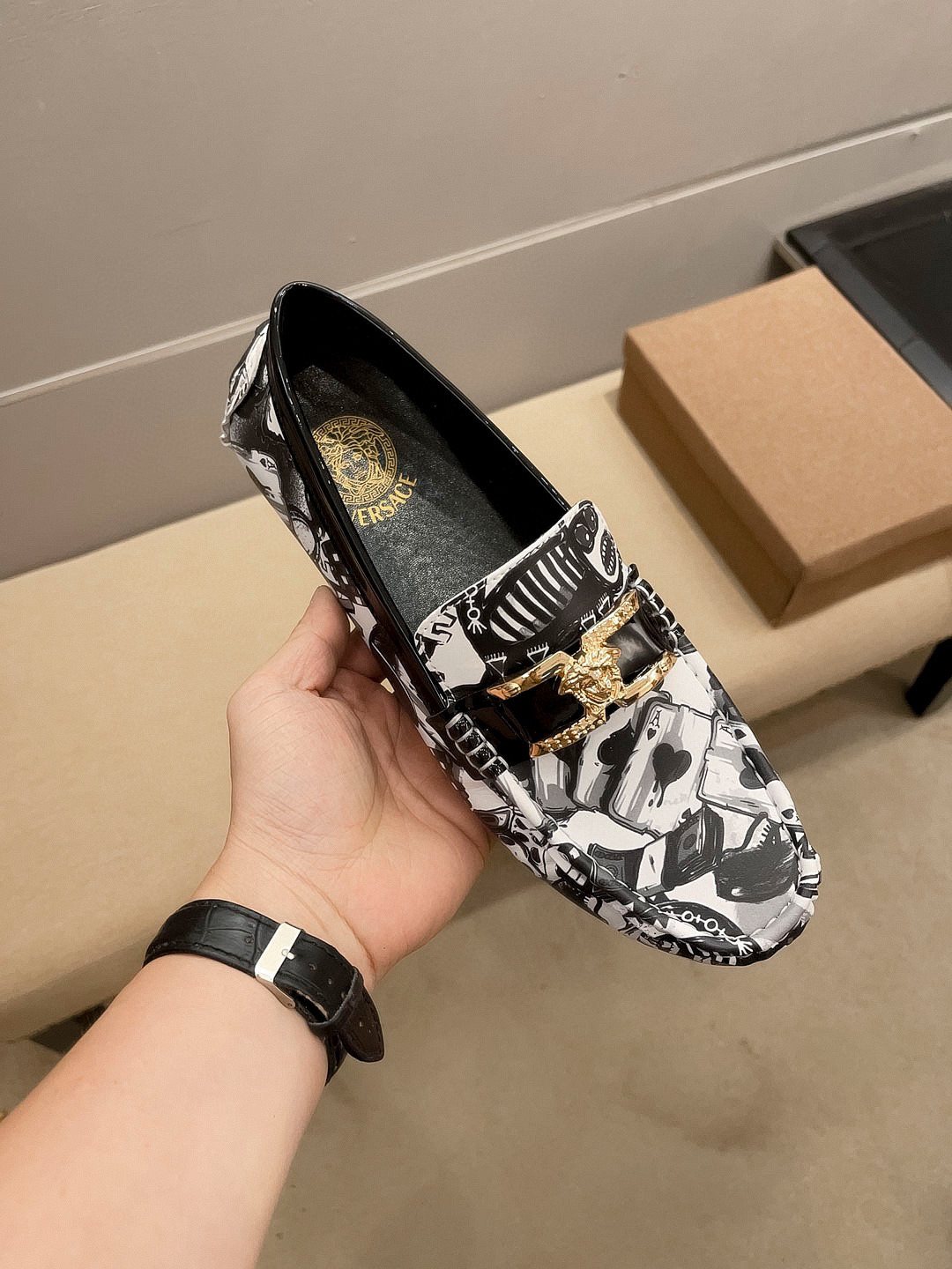Black & White Graphic Gold-Tone Loafers — model