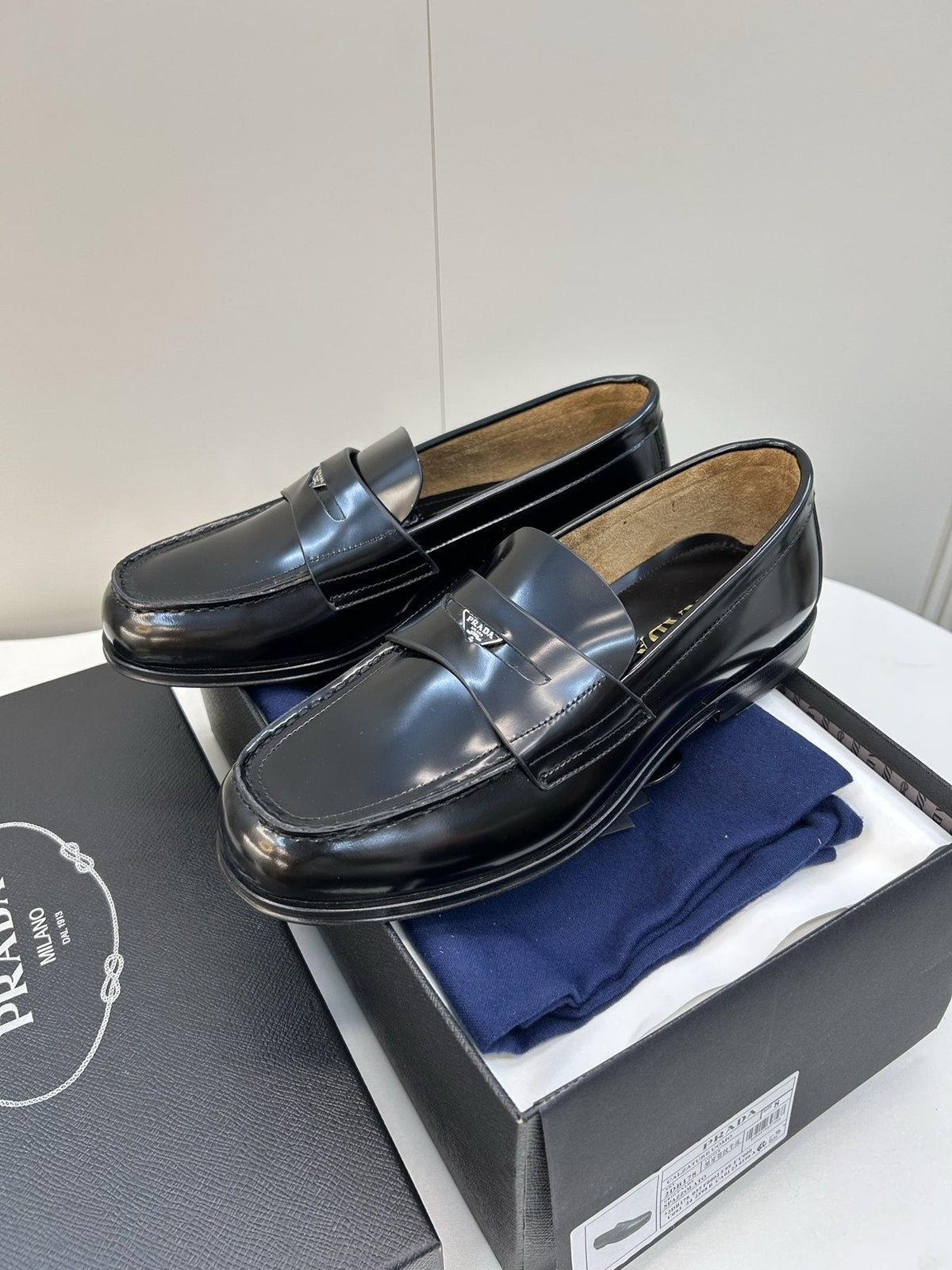 Prada Black Glossy Moc-Toe Loafers — front
