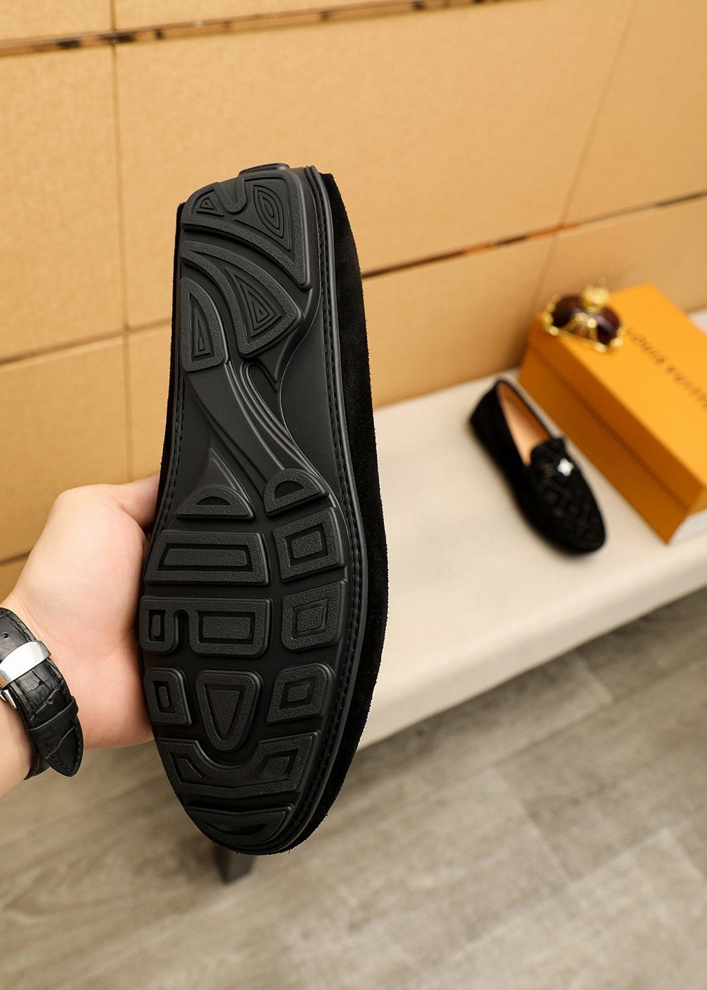Louis Vuitton Embossed Metal-Detail Loafers — model