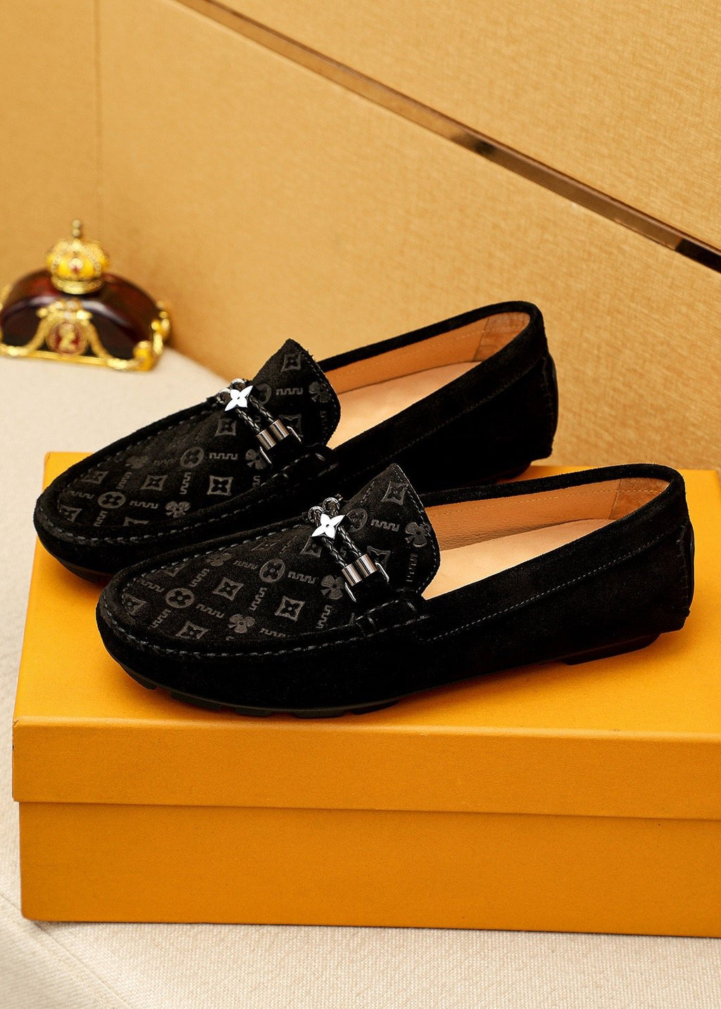 Louis Vuitton Embossed Metal-Detail Loafers — front