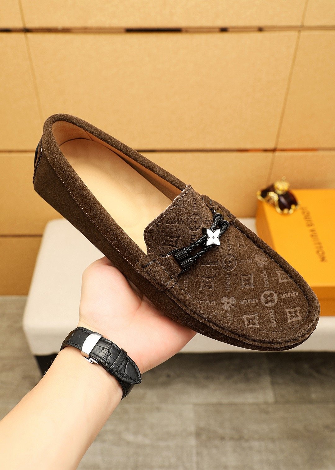 Louis Vuitton Embossed Metal-Detail Loafers — model