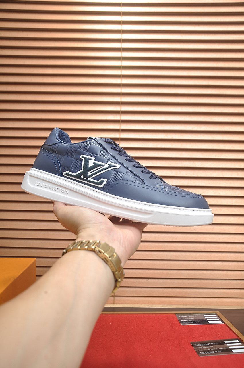 Louis Vuitton Paneled Low-Top Sneakers — model