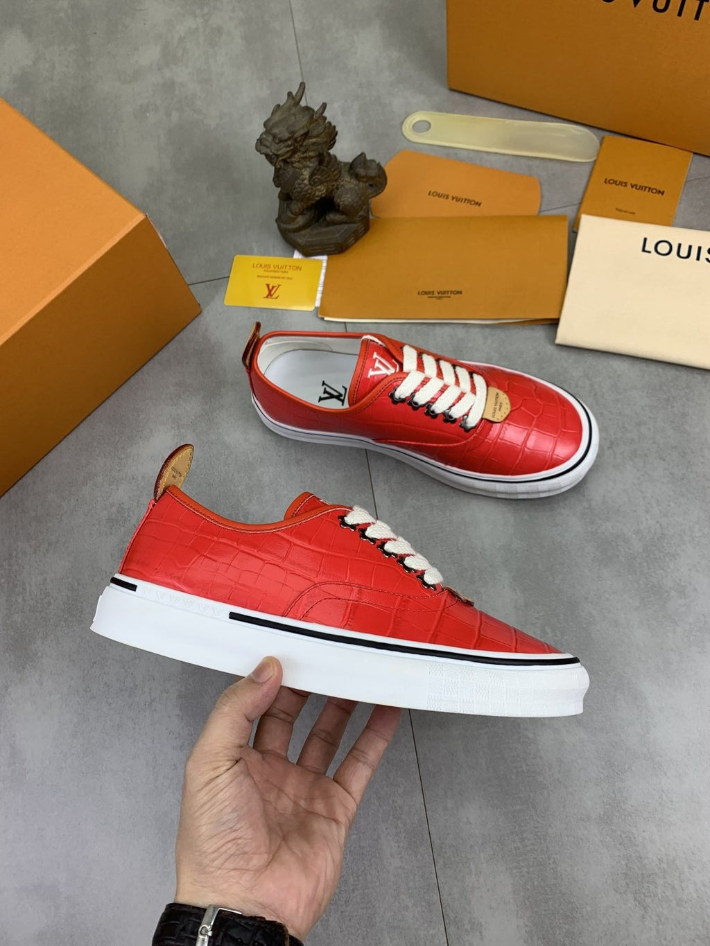 Louis Vuitton Red Embossed Low-Top Sneakers — model