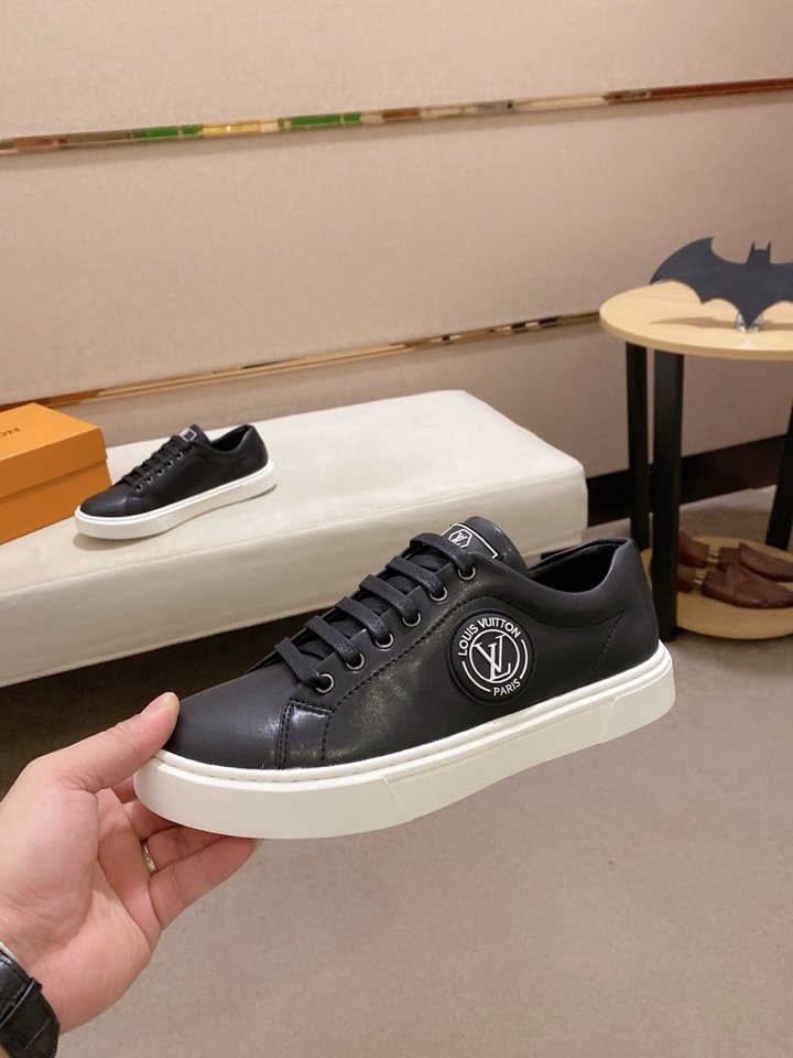 Louis Vuitton Emblem Low-Top Sneakers — model
