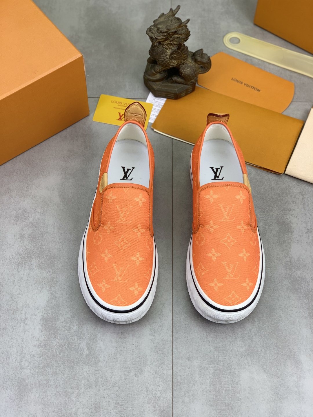 Louis Vuitton Orange Patterned Slip-On Shoes — hero