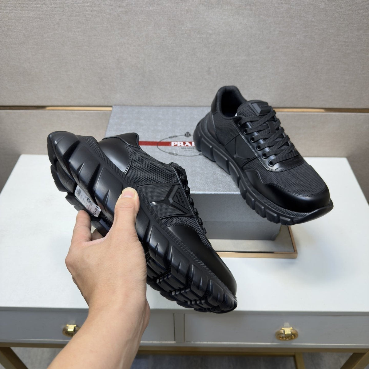 Prada Paneled Low-Top Sneakers — model