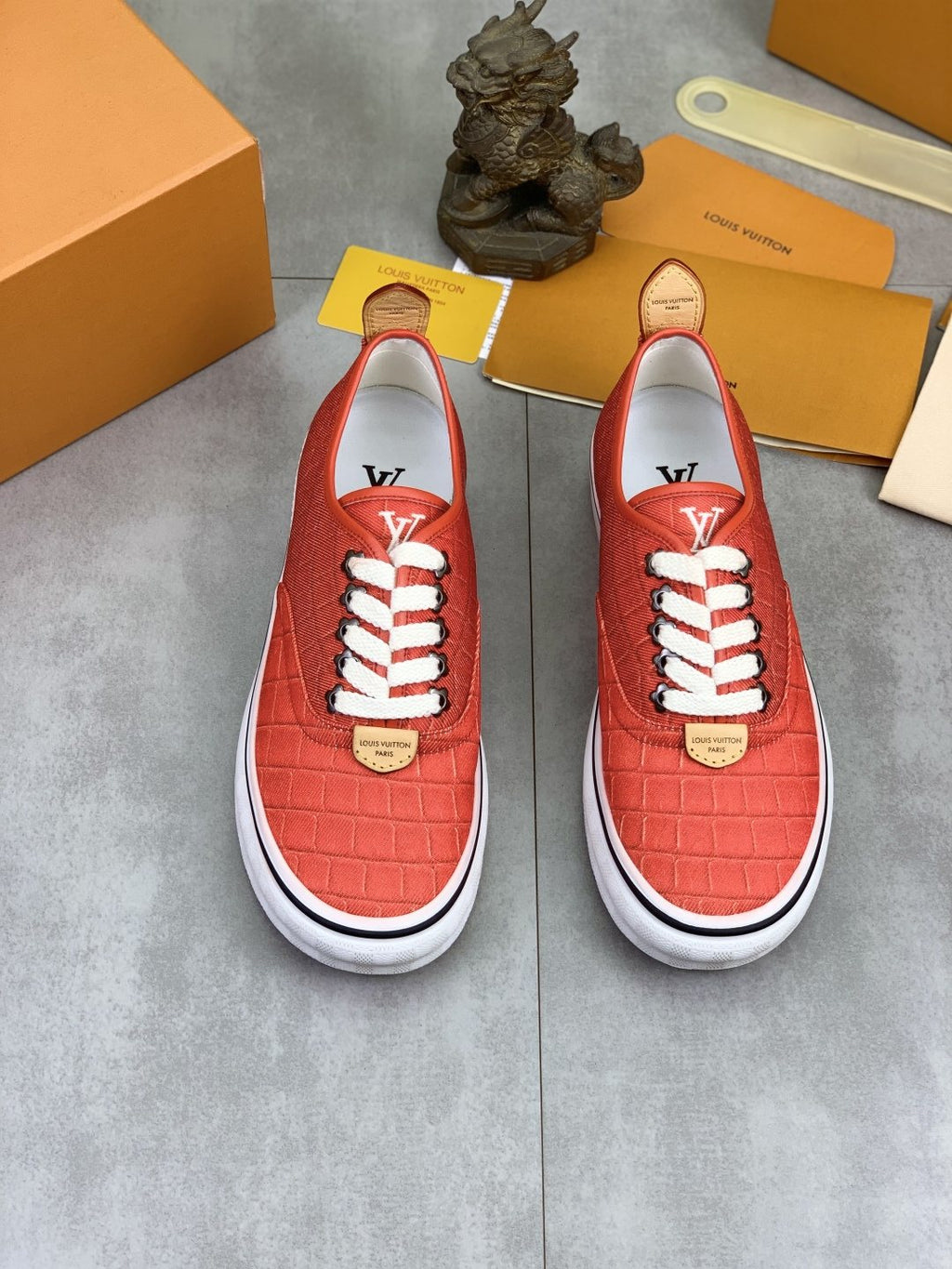 Louis Vuitton Coral Red Textured Low-Top Sneakers — hero