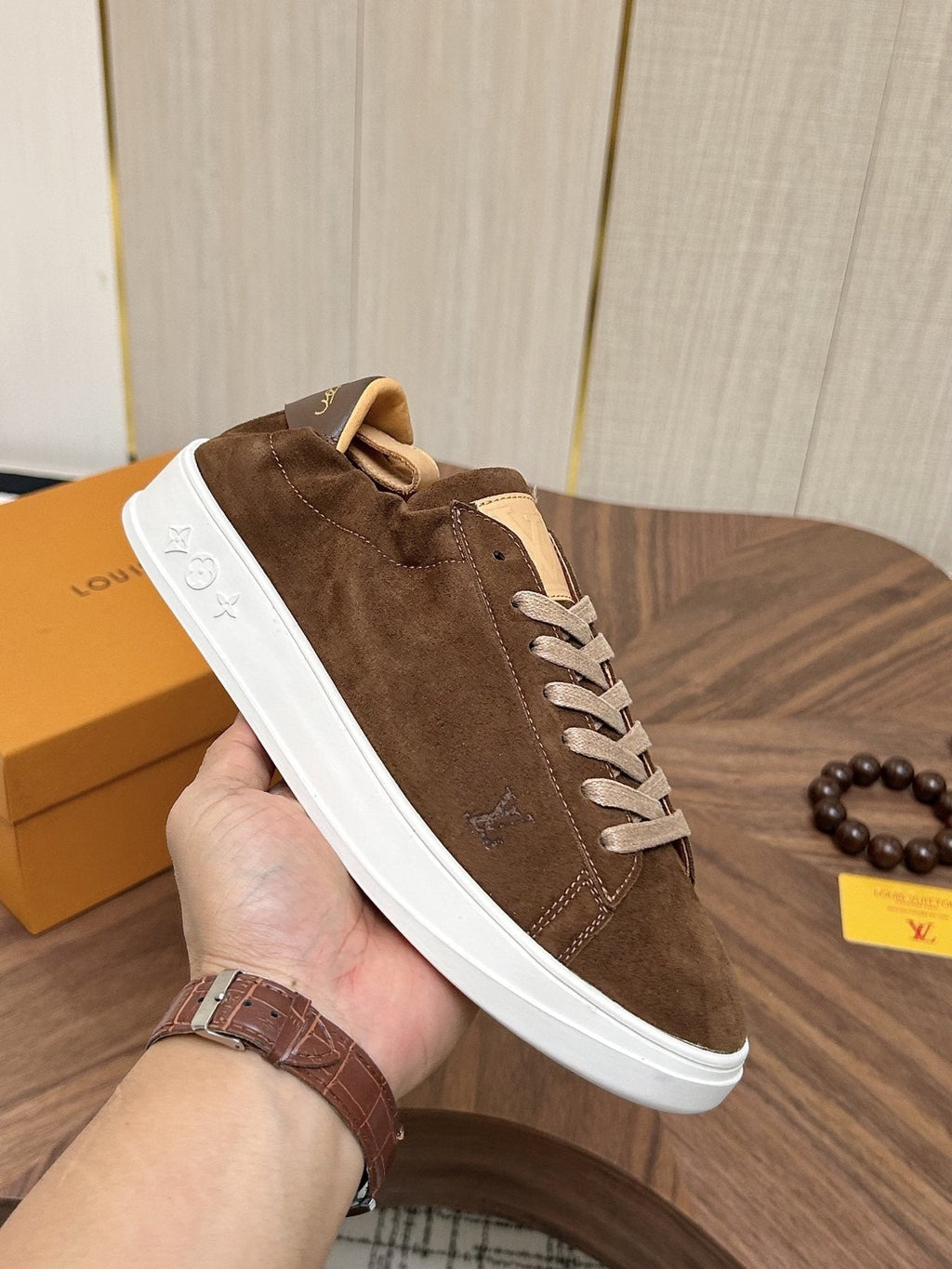 Louis Vuitton Brown Textured Low-Top Sneakers — model