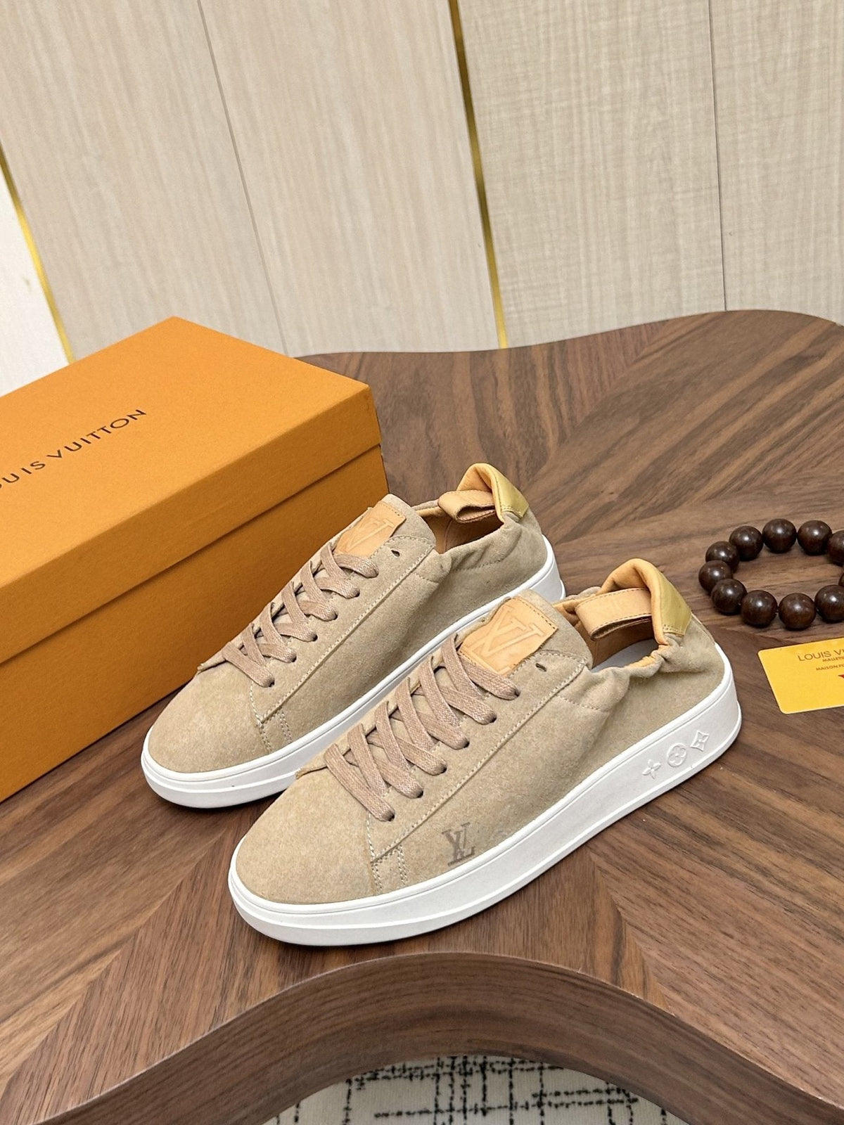 Louis Vuitton Brown Textured Low-Top Sneakers — front