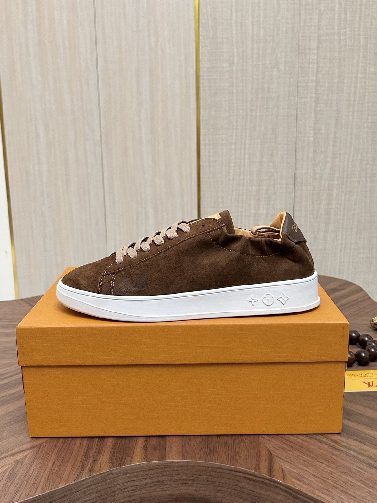 Louis Vuitton Brown Textured Low-Top Sneakers — side