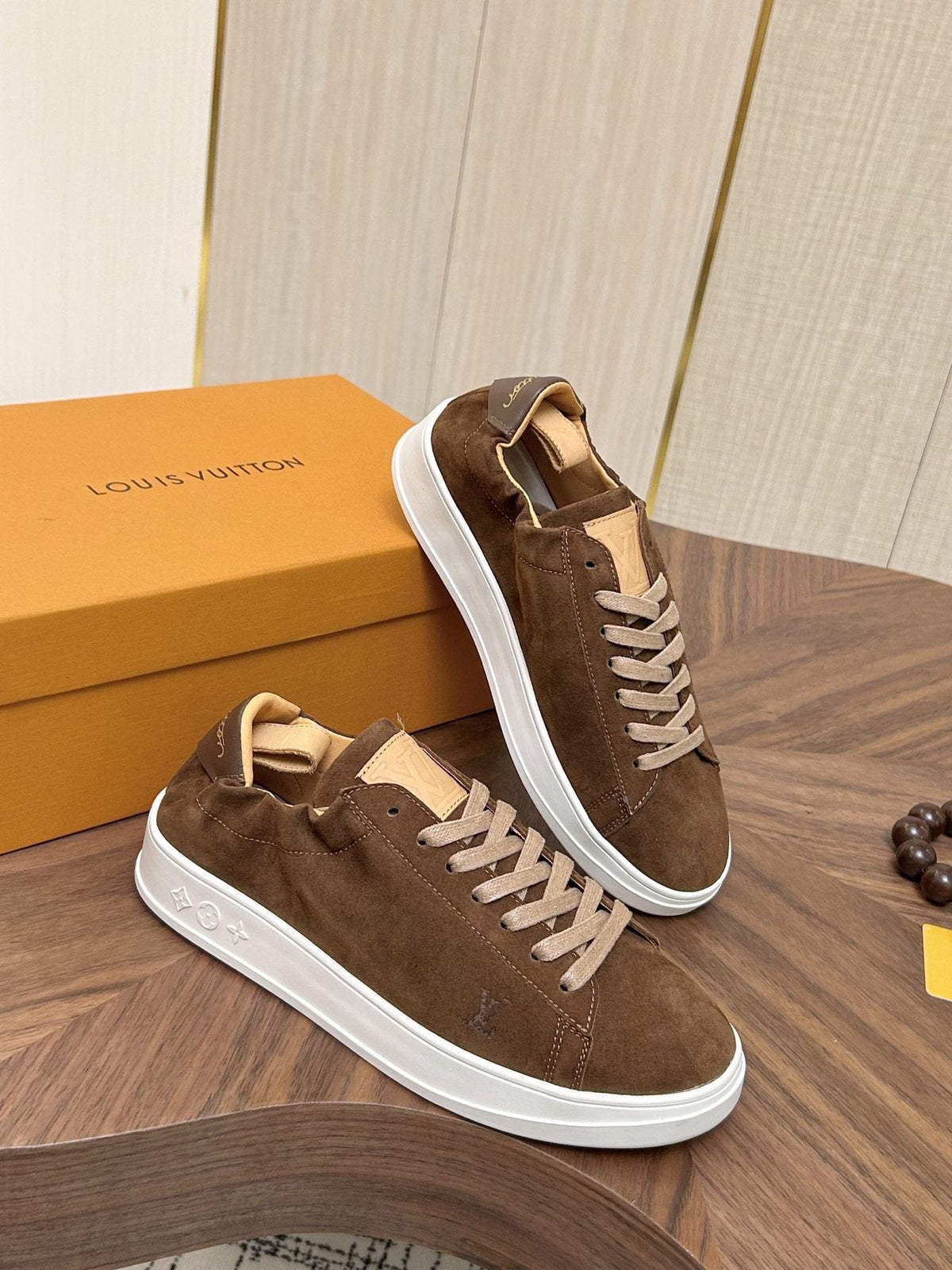 Louis Vuitton Brown Textured Low-Top Sneakers — front