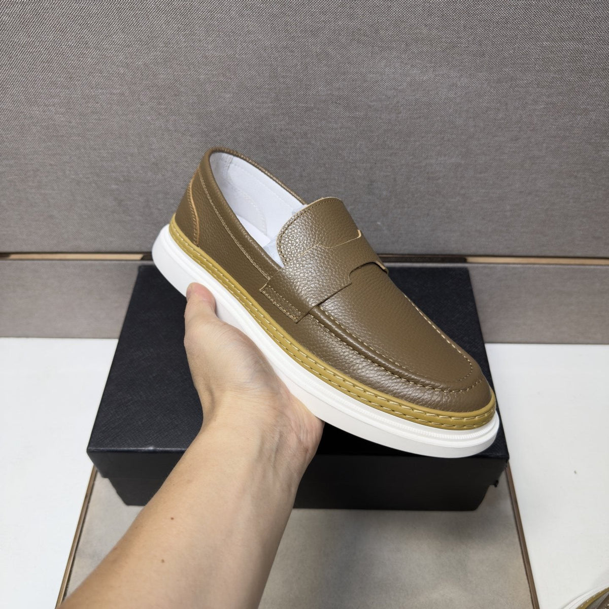 Prada Gold Accent Slip-On Loafers — model