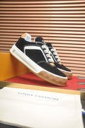 Louis Vuitton Paneled Low-Top Sneakers — front