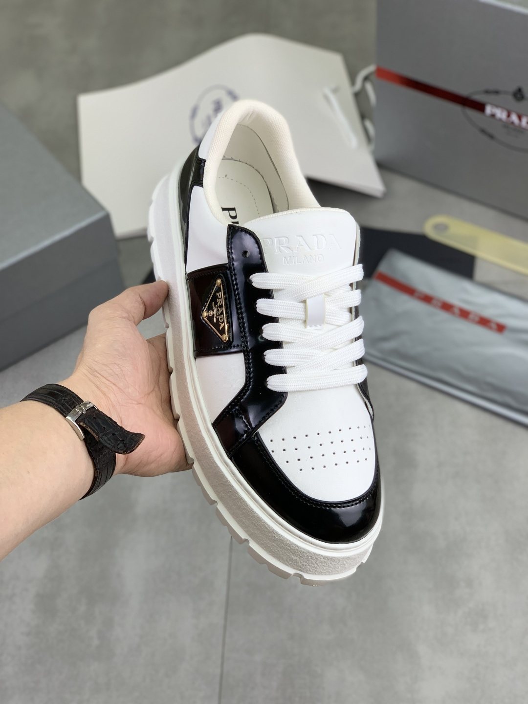 Prada Paneled Lug-Sole Low-Top Sneakers — model