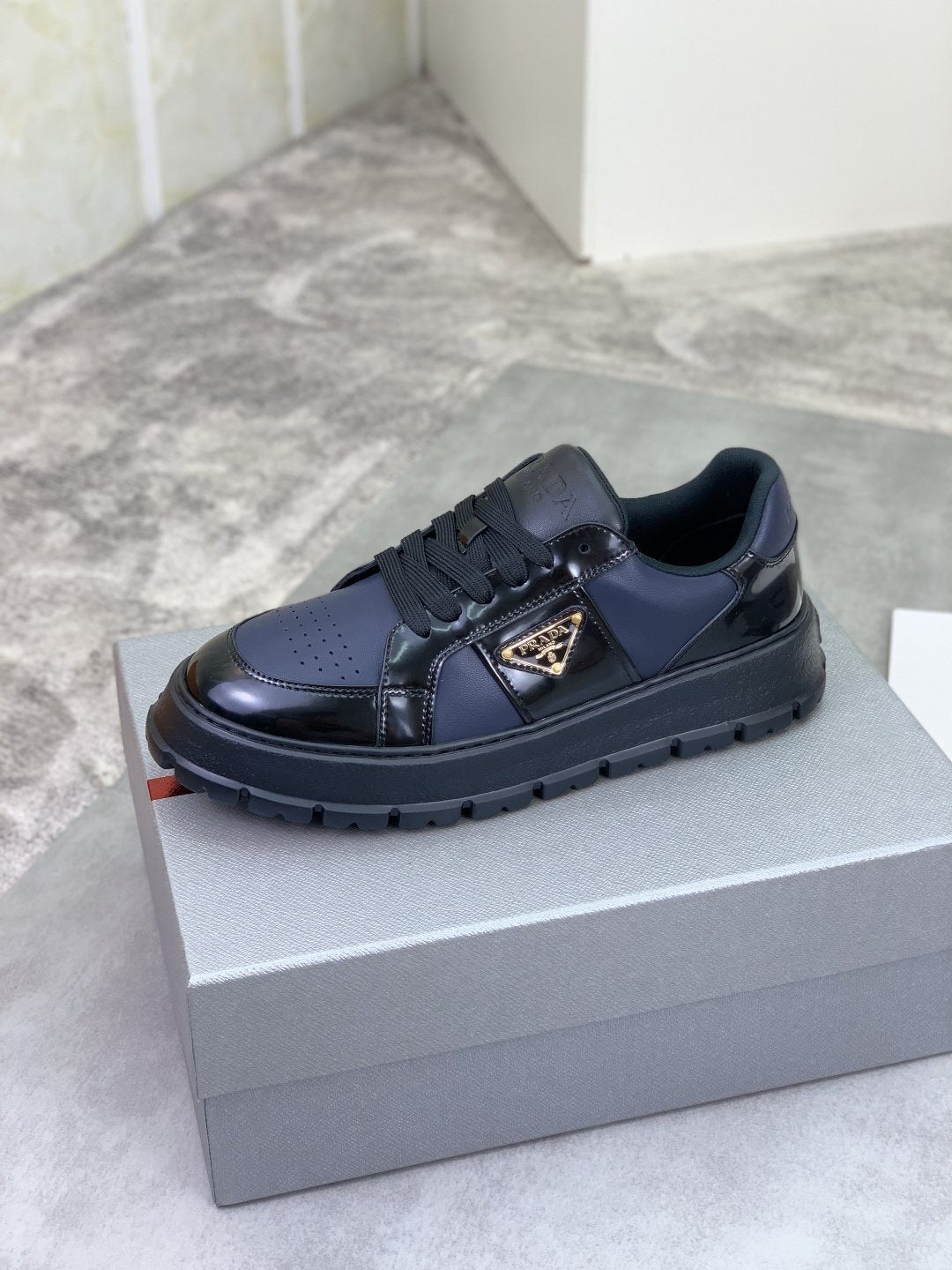 Prada Paneled Lug-Sole Low-Top Sneakers — hero