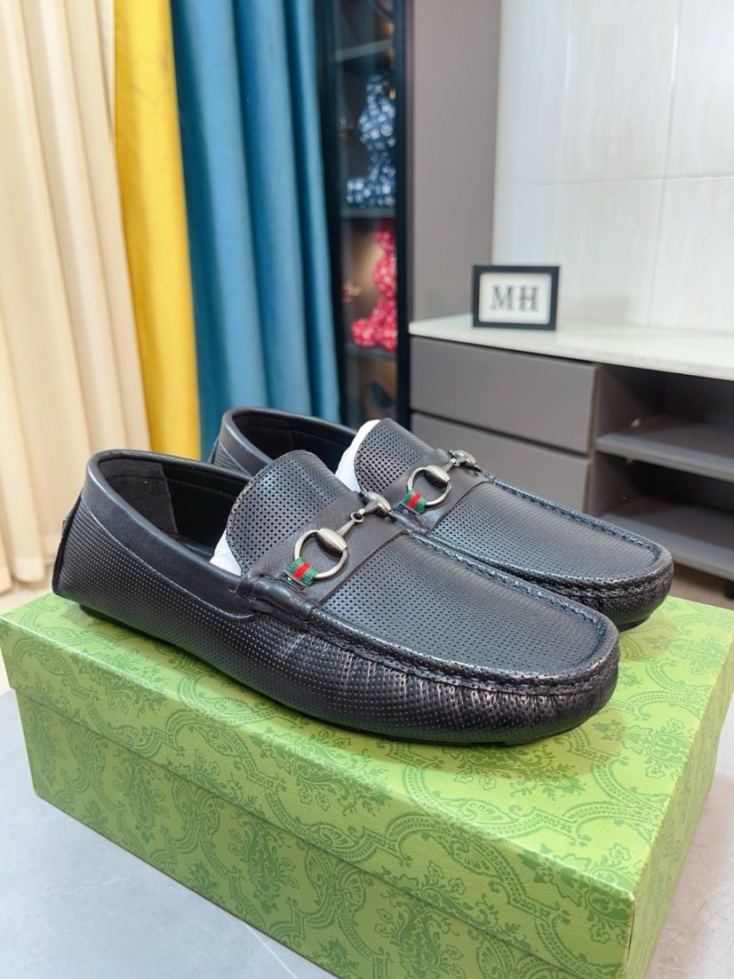 Gucci Perforated Metal Hardware Loafers — front