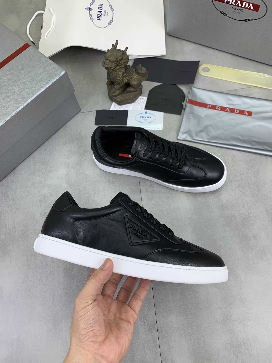 Prada Paneled Low-Top Sneakers — model