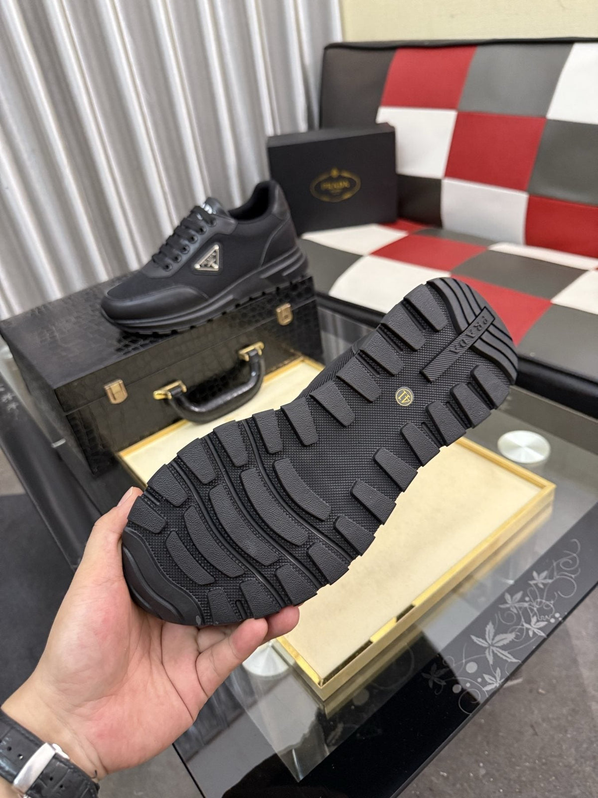 Prada Triangle Plaque Low-Top Sneakers — detail
