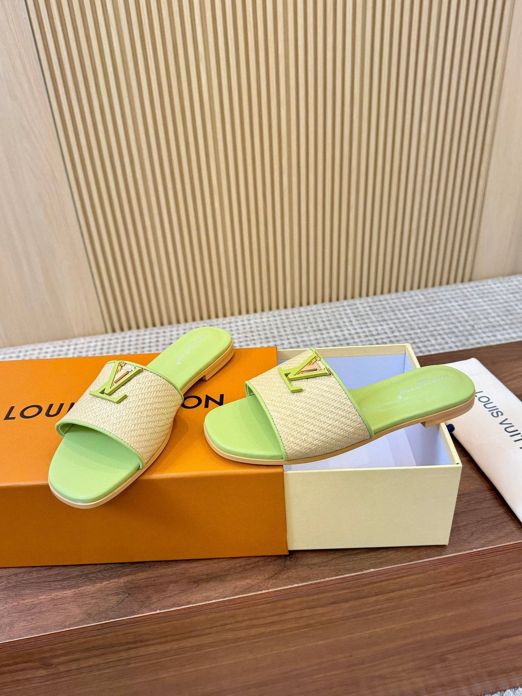 Louis Vuitton Textured Logo Slide Sandals — front