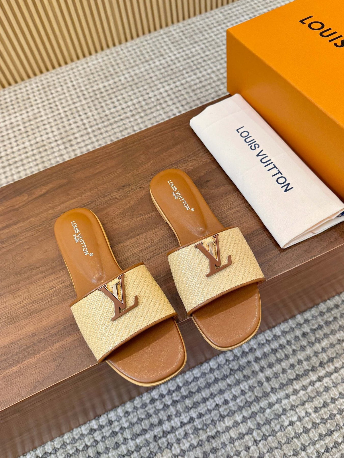 Louis Vuitton Textured Logo Slide Sandals — front