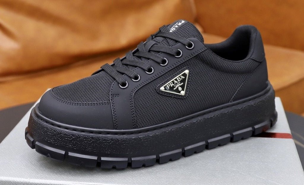 Prada Paneled Chunky-Sole Sneakers — hero