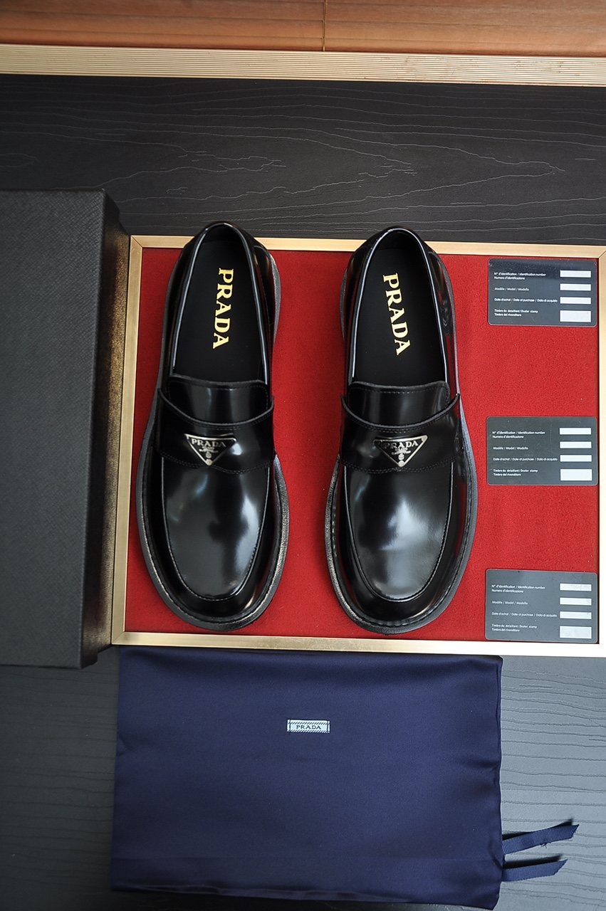 Prada Lug-Sole Strap Loafers — front