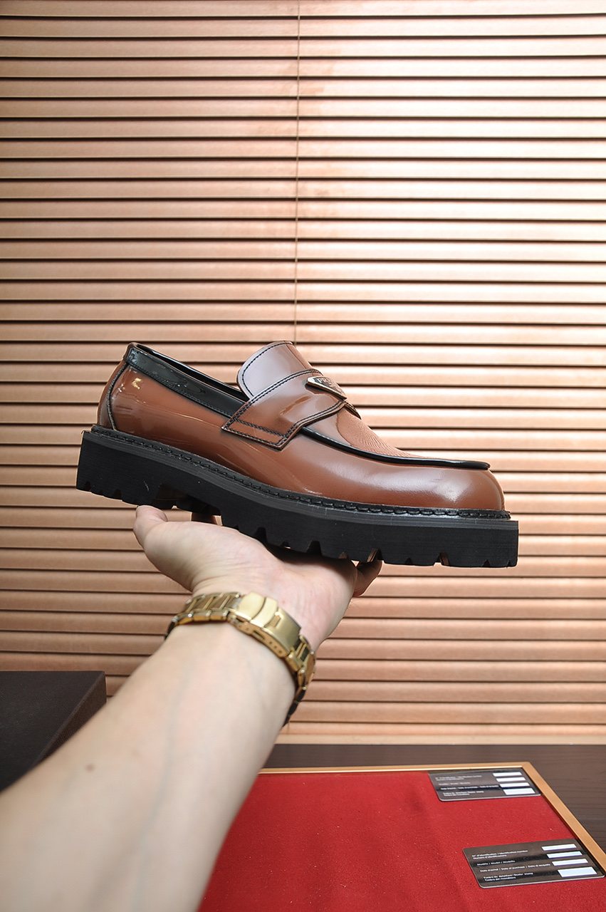 Prada Lug-Sole Strap Loafers — model