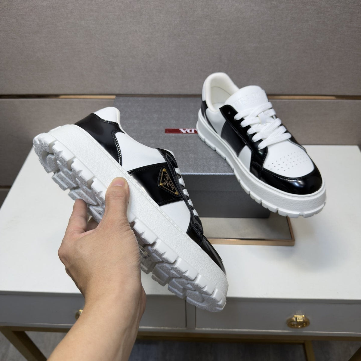 Prada Paneled Low-Top Sneakers — model