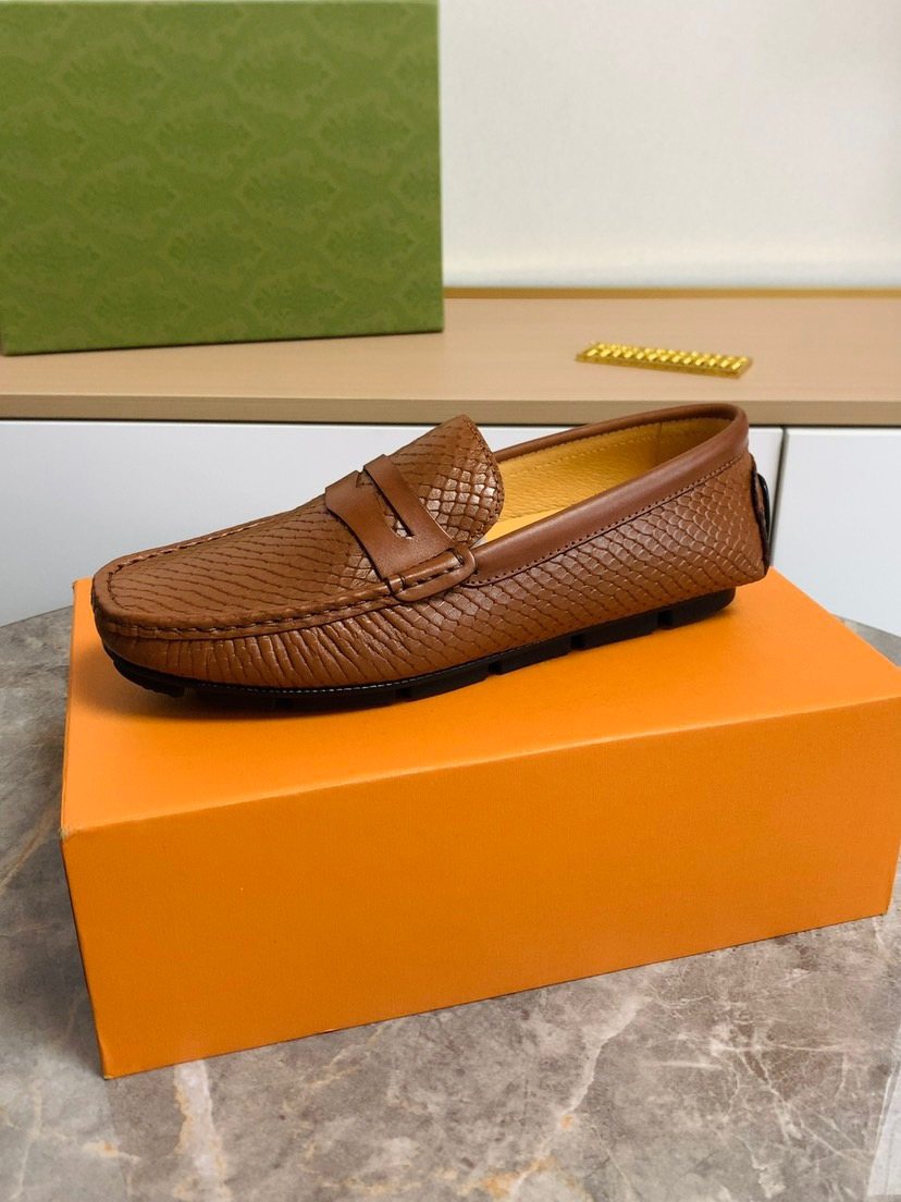 Louis Vuitton Textured Penny Loafers — side