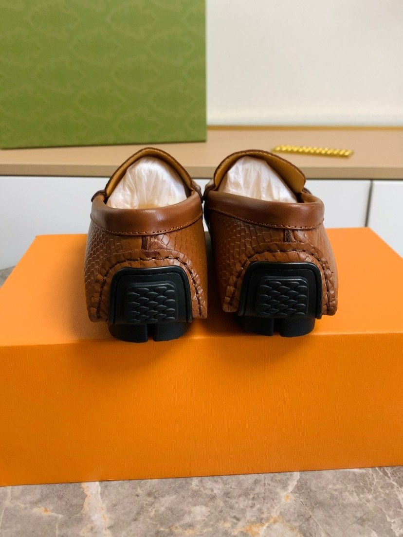Louis Vuitton Textured Penny Loafers — back