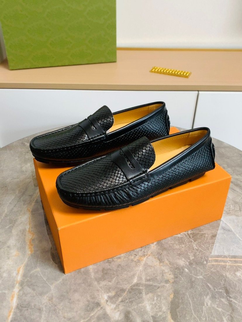 Louis Vuitton Textured Penny Loafers — front