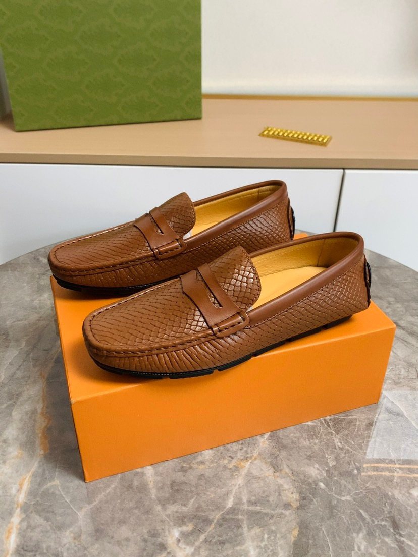 Louis Vuitton Textured Penny Loafers — front