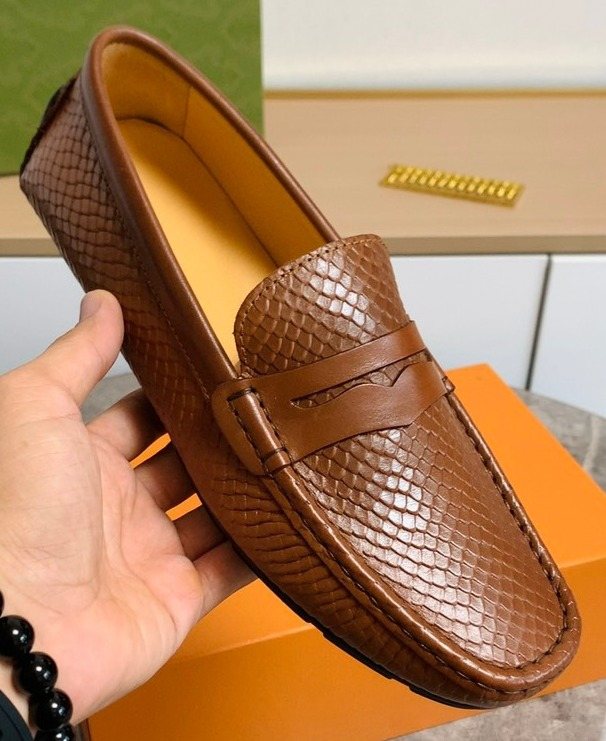 Louis Vuitton Textured Penny Loafers — hero