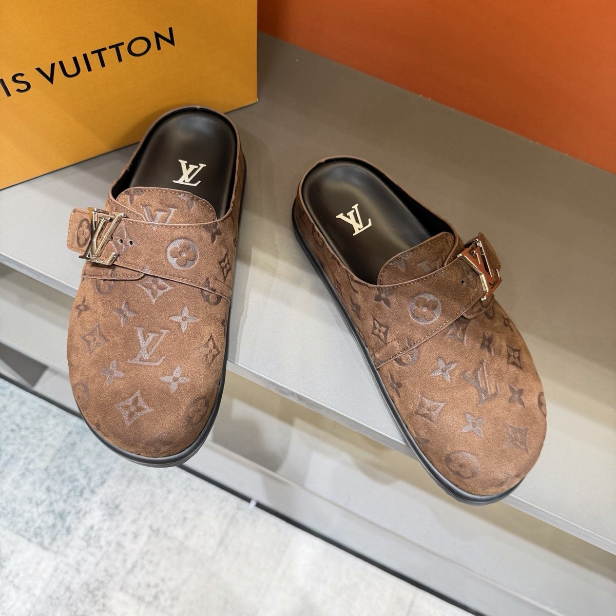 Louis Vuitton Embossed Buckle Slide Sandals — front